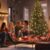 friends celebrating Christmas together, cozy indoor setting, Christmas tree and lights