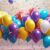 inspirational birthday celebration with balloons and confetti