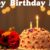 Emotionale Geburtstagsfeier mit Kuchen und Blumen.